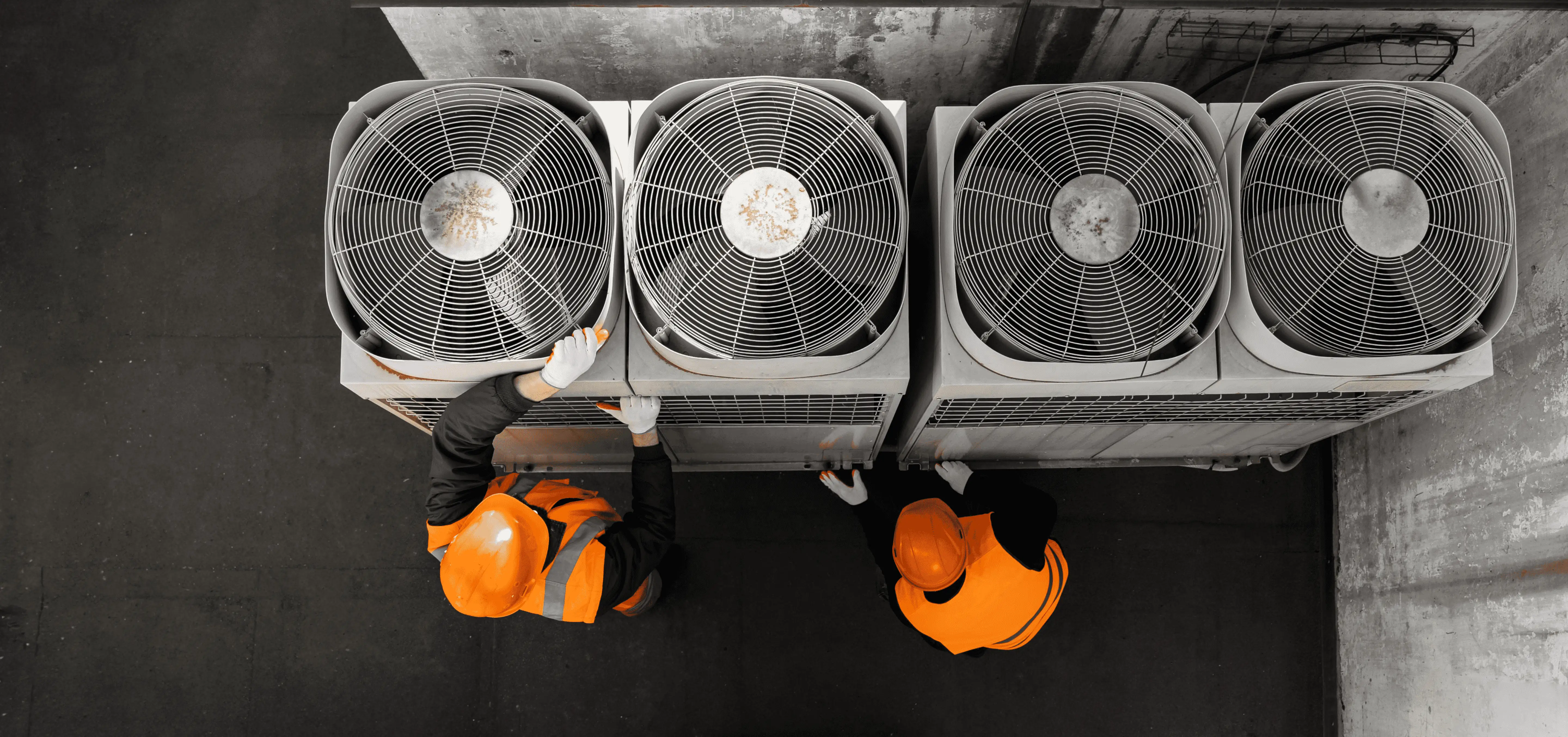 men-working-cooling-towers